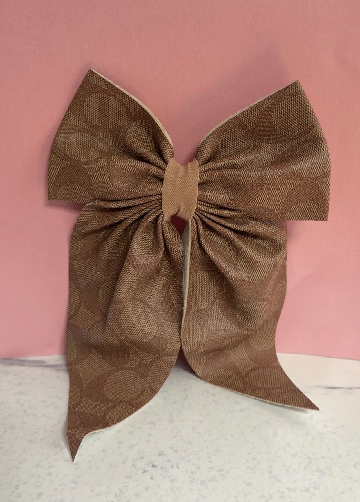 Tan Bow