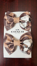 Brown Pair Of Bows